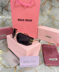 OCCHIALI DA SOLE MIU MIU