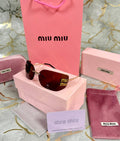 OCCHIALI DA SOLE MIU MIU