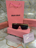 OCCHIALI DA SOLE MIU MIU