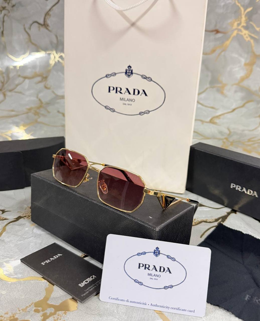 OCCHIALI DA SOLE PRADA